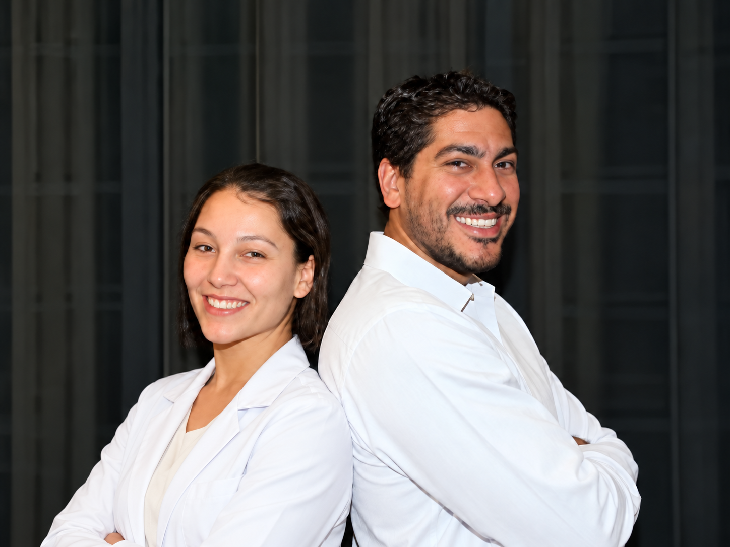 Two Dysart Dental team members smiling together