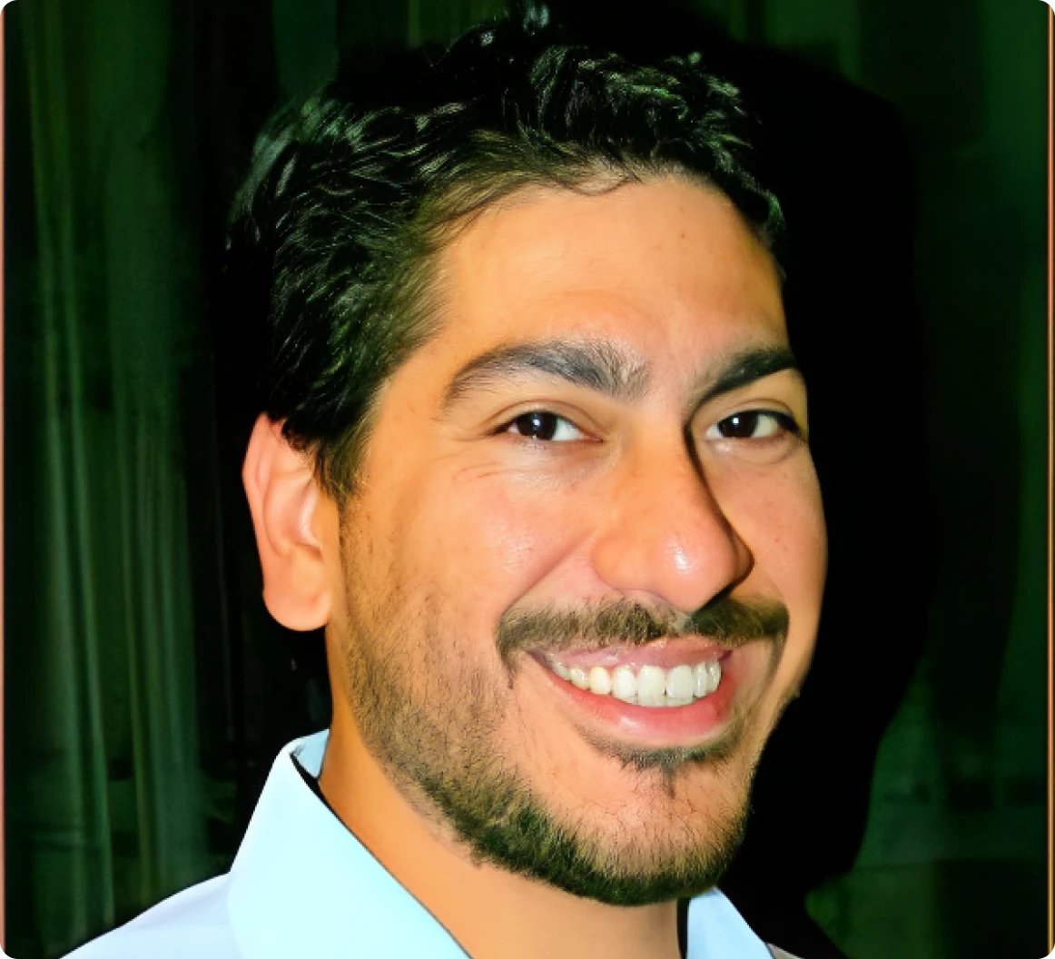 Smiling man with a beard